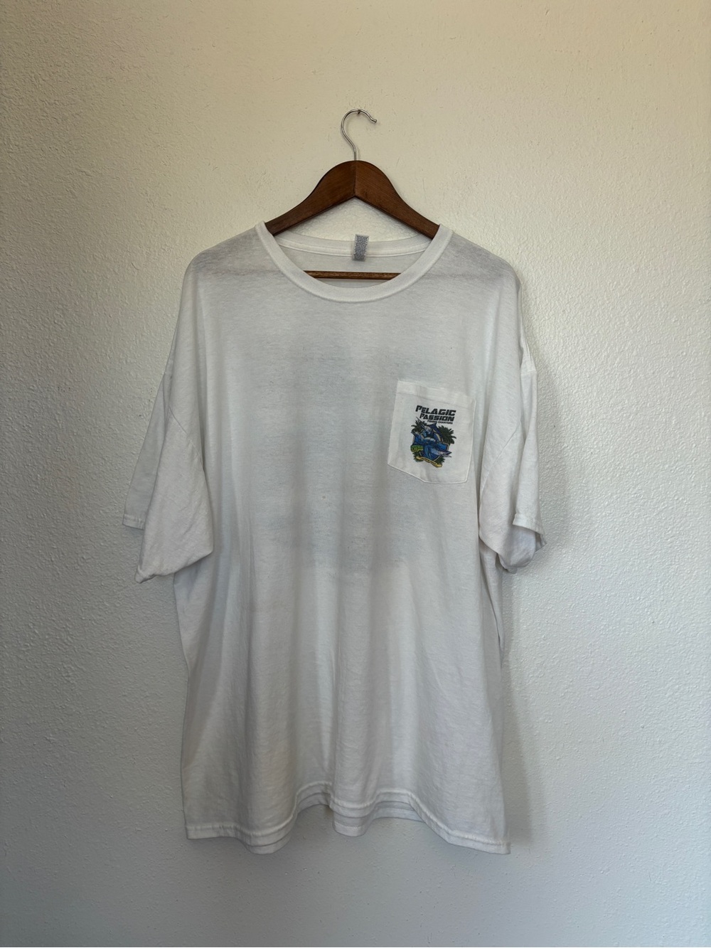 Pelagic White Short-Sleeve Pocket Tee with Blue/Green Fish Graphic